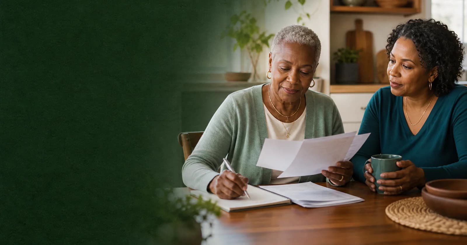 An older woman reviewing a savings checklist with her daughter